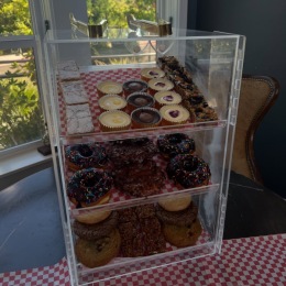 display case with donuts