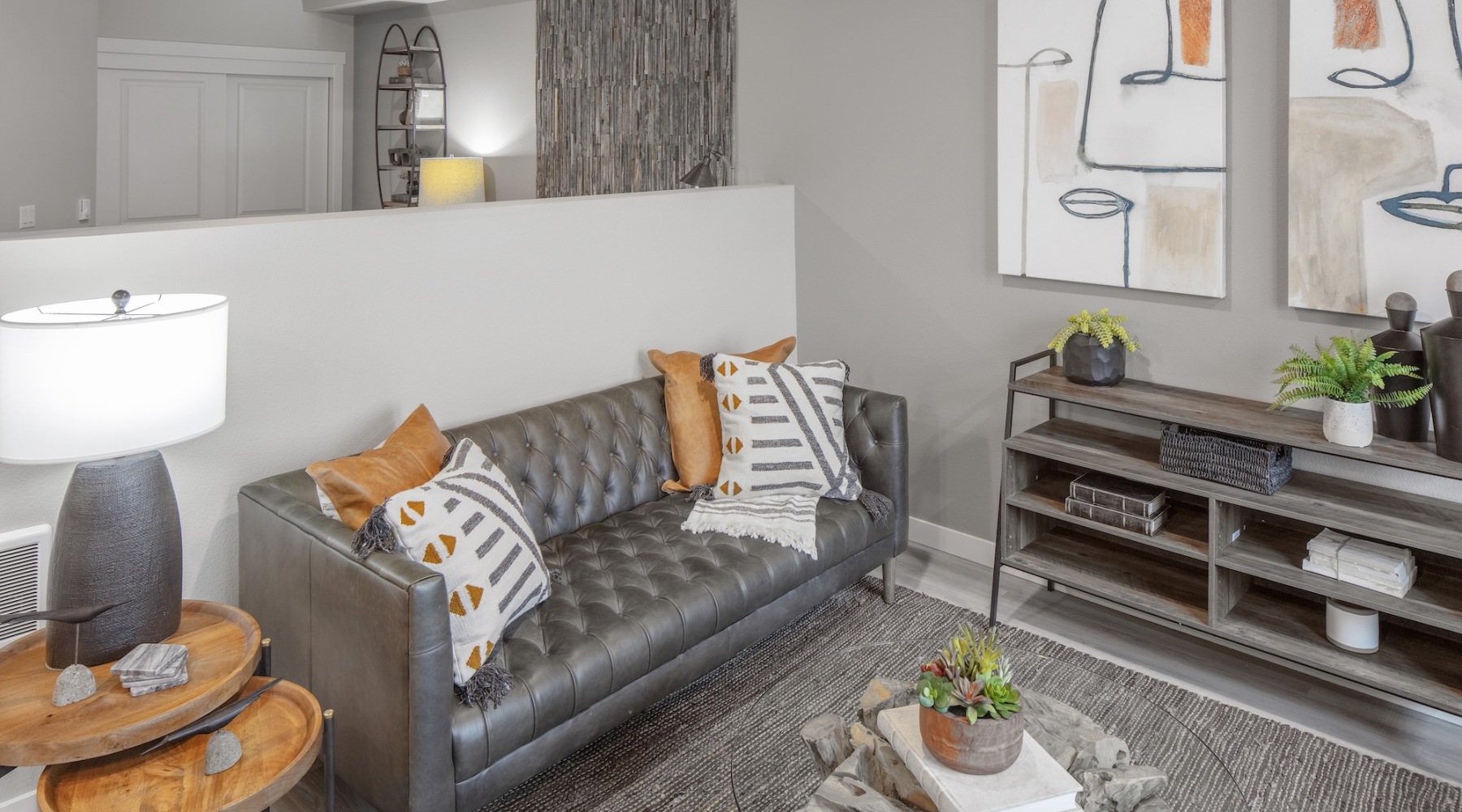 a living room with a couch and coffee table