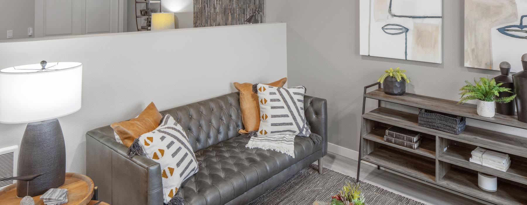 a living room with a couch and coffee table