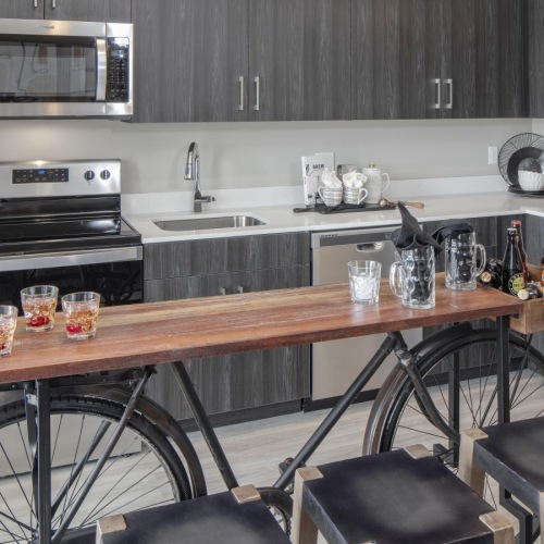 a kitchen with a table and chairs