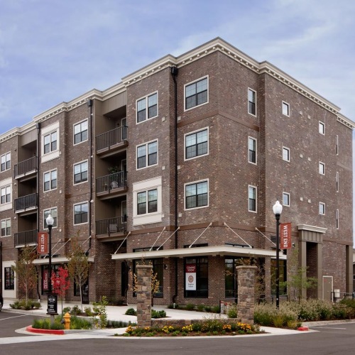a large building with a street in front of it